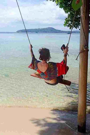 Sarah on swing on Koh Ta Kiev