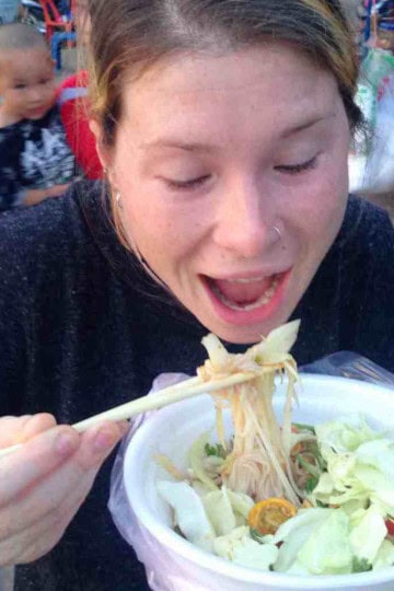 Sarah eating street food in Laos