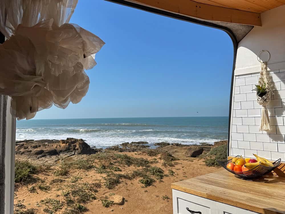 View of sea from campervan door